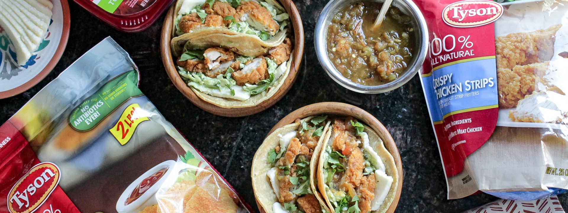 Crispy Chicken tacos in corn tortillas with creamy avocado slaw recipe